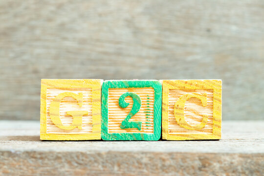 Color alphabet letter block in word G2C (Abbreviation of Government to Citizen) on wood background