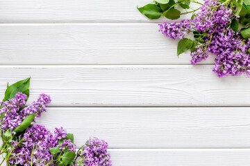 Border of spring lilac flowers. Flat lay, top view