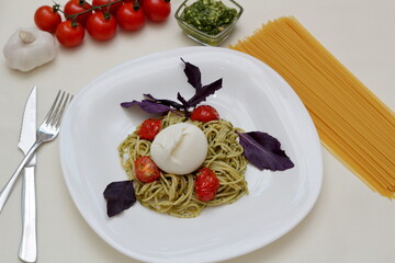 pasta with tomato sauce and basil