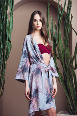 Woman in pareo. Beachwear. Beautiful tender woman posing