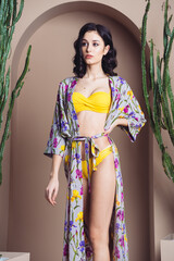Youmg attractive woman in beachwear pareo