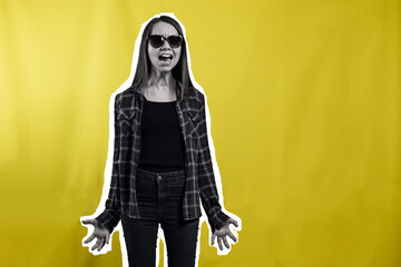 Portrait of a hipster girl in the style of a magazine collage on a yellow background. A hipster girl in dark glasses screams against a yellow background. Shouting, emotions.