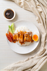crispy pork on rice with barbecue sauce