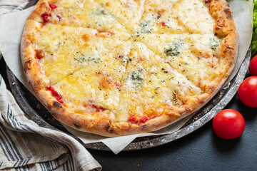 pizza cheesy 4 cheese fast food  assorted types portion on the table meal snack top view copy space food background