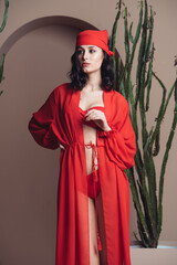 Young woman red beachwear clothes