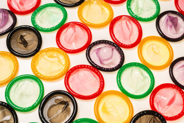 Colorful condoms background.