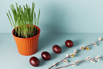 Easter oat, eggs (colored with onion peel) and pussy willow branch. Easter decoration.