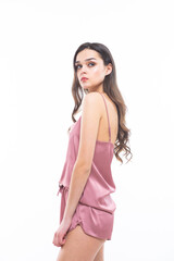 Beautiful caucasian woman in silk nightwear