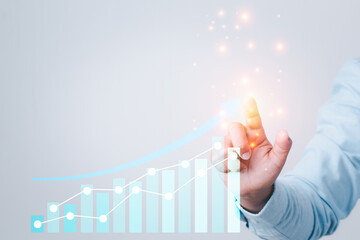 Businessman hand touching arrow graph or chart coporate technology plan business development to...