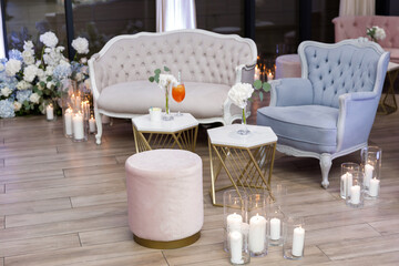 Beautiful interior of luxury restaurant. Concept of expensive relaxation and relaxation in bar. Pink and blue velvet restaurant sofas