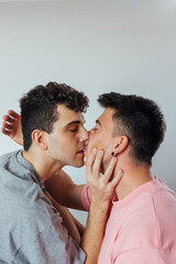 Gay couple kissing each other
