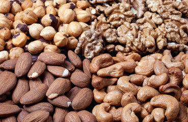 Assortment of tasty nuts, close up. Mix of different nuts.