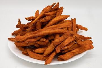 Big Portion of Sweet Potato Fries on a White Plate
