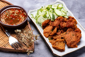 Thai fried fish cakes on the gray table