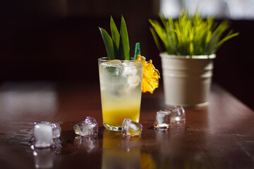 A cold cocktail standing on the table.