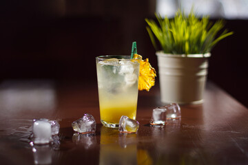 A cold cocktail standing on the table.