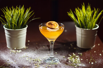 A cold cocktail standing on the table.