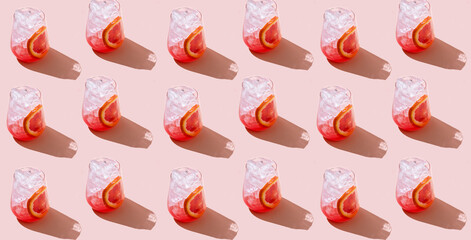 Seamless pattern made of cocktail from sicilian oranges. Eating concept.