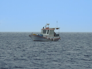 Small fishing boat in the sea