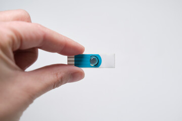 Hand holding biomaterial 3D printed onto a nano electrode. New technology approach concept.