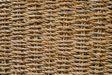texture of wicker basket with straw close up