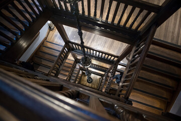 Old fashioned wooden stairwell in Liberty, a department store in the West End of London