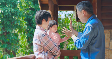 grandparents have fun with girl