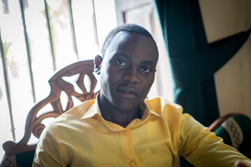 African businessman standing on the nice gate