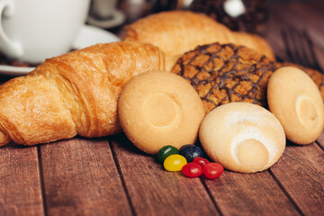 sweet biscuits on a plate a cup with a drink candy Dessert snack