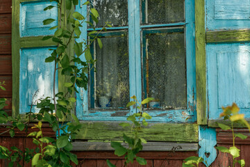 Fototapeta na wymiar old russian window with shutters