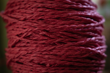 ball of red paper thread