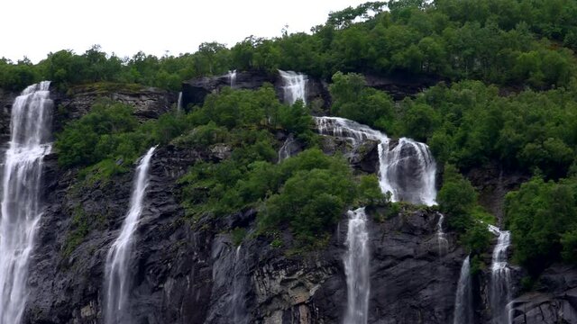 waterfall in the Fjords mountains 