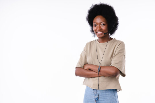 Confident african teen girl working as an IT support isolated over white background