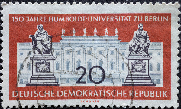 GERMANY, DDR - CIRCA 1960 : a postage stamp from Germany, GDR showing the main building of the Humboldt University in Berlin, monuments to the brothers Wilhelm and Alexander von Humboldt