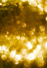 Golden solar circular glare bokeh, wallpaper, texture. 