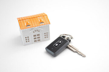 Car keys with house model. Concept of success and real estate mortgage investment
