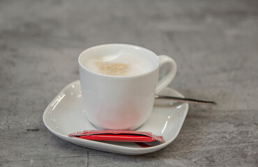Tasse Kaffee mit Zucker