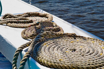 Coils of rope on the rail of a riverboat
