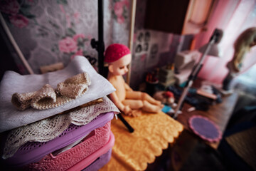 realistic handmade doll. expensive collectible toy with designer clothes