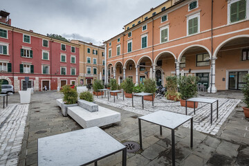 Cityscape. Carrara city center: Piazza Alberica with the commemorative monument in the center and...