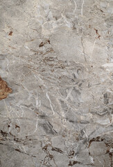 Ceramic porcelain stoneware tile texture or pattern. Natural stone gray multicolored color with veining