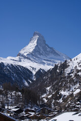 Beautiful winter mountain panorama with famous peak Matterhorn (4478m) seen from Gornergrat, Zermatt, Switzerland. Photo taken March 23rd, 2021.