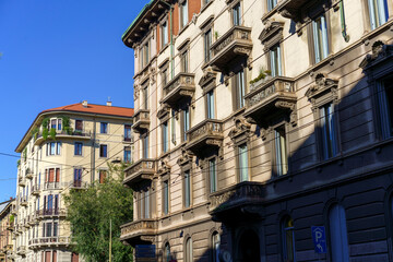 Fototapeta na wymiar Historic buildings along via San Michele del Carso in Milan