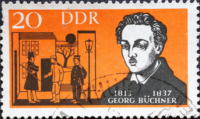 GERMANY, DDR - CIRCA 1963  : a postage stamp from Germany, GDR showing a portrait of the writer...