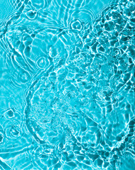 Fototapeta na wymiar Blue water texture background on the noon sunlight. 