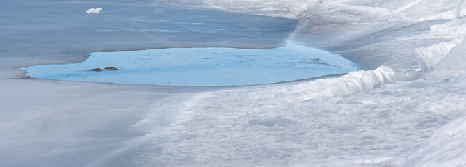Obraz premium The abstract background of ice structure in a lake landscape. Farnebofjarden national park in north of Sweden.