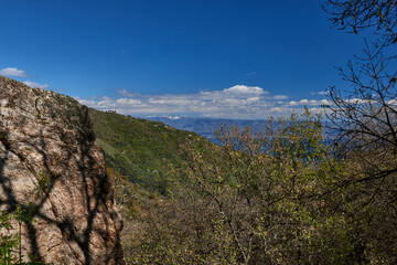 panoramic view of the Messina strait in a particular spring day with blue sky and limpid coast of Calabria with splashes of snow on the hills