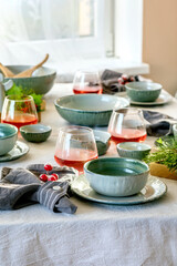 Christmas table setting with ceramic tableware