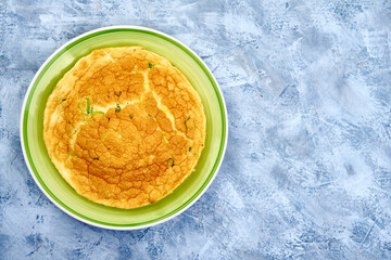Morning omelette on grunge background. Healthy breakfast. High resolution image. Copy space
