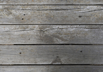 Old unpainted wooden boards texture background